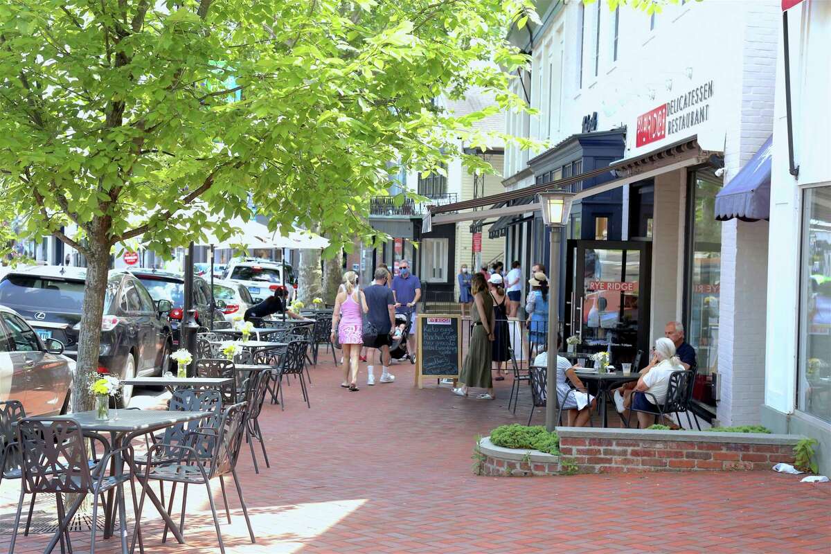 Diners and visitors roamed Main Street on Sunday, July 12, 2020, in Westport, Conn.