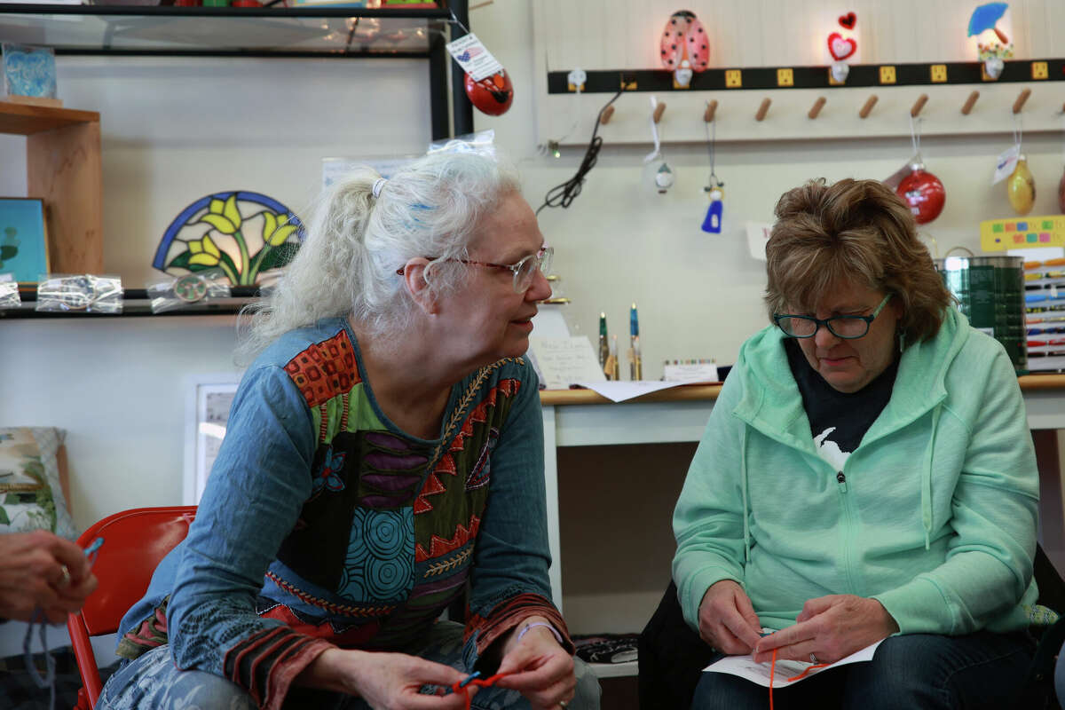 Georgia Brown, a former computer science teacher, now teaches the art of crochet at Kaleva Art Gallery. Among three students taking a class with Brown on Saturday, is Sherry Boer--a fellow artist whose specialty is in jewelry and ceramics. 
