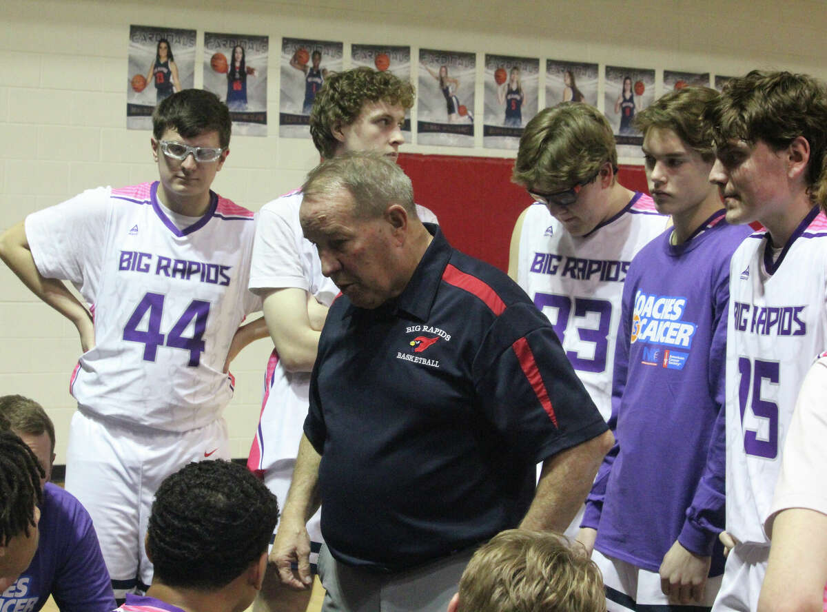 Big Rapids coach Kent Ingles talks with his basketball team during last Thursday's game with Morley Stanwood.