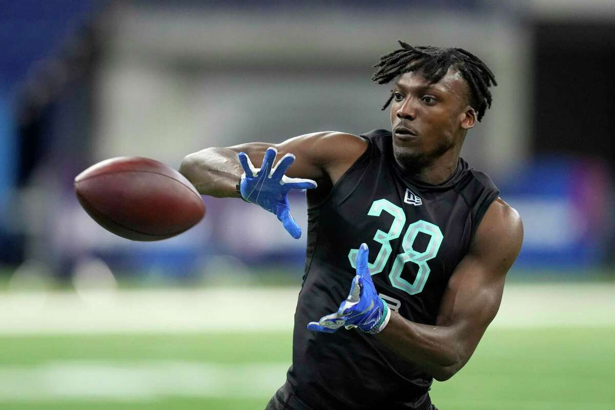 UTSA defensive back Tariq Woolen participates in a drill at the NFL football scouting combine, Sunday, March 6, 2022, in Indianapolis. (AP Photo/Charlie Neibergall)