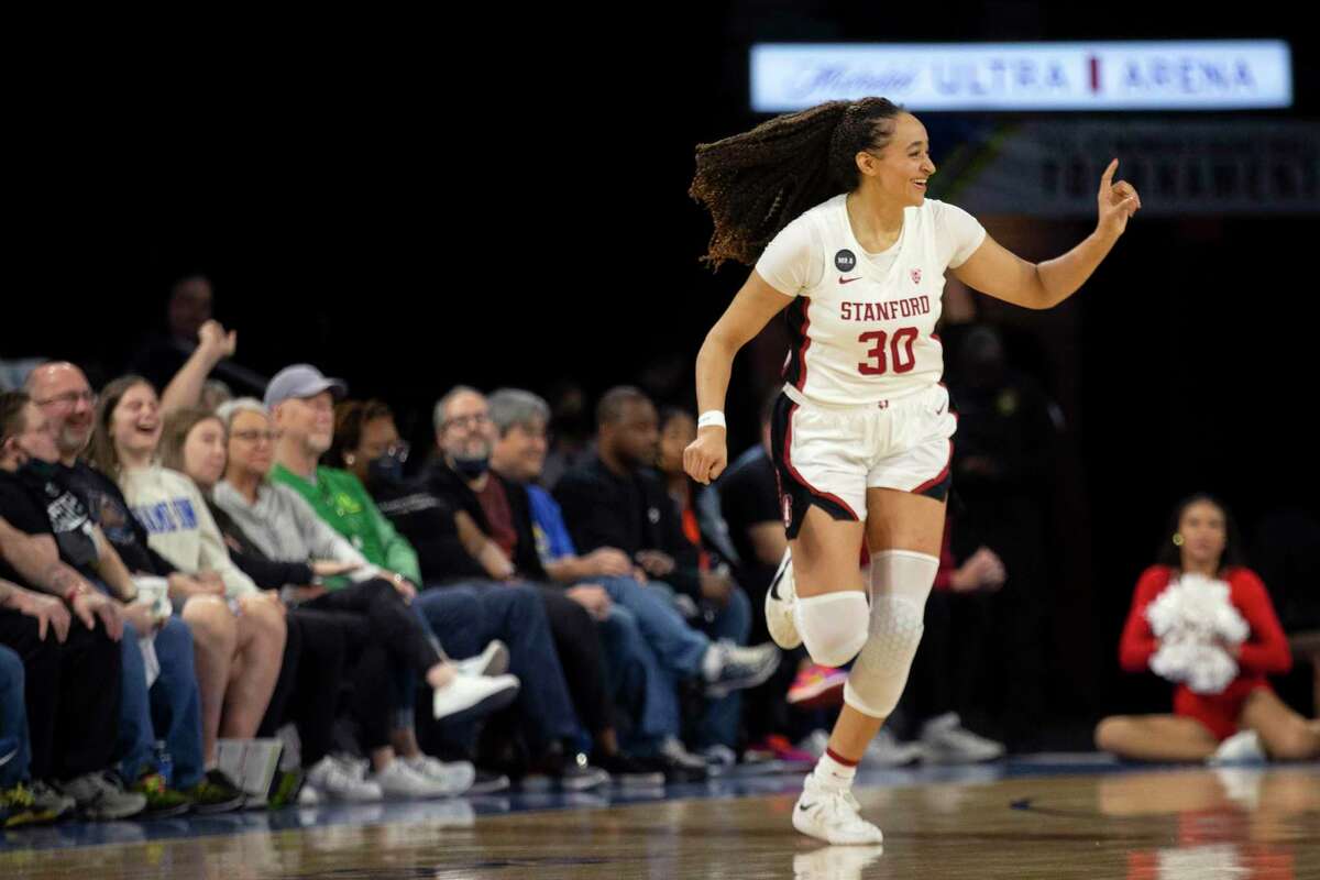 Stanford guard Haley Jones (30) celebrates a 3-point basket against Utah during the first half of an NCAA college basketball game for the Pac-12 tournament championship Sunday, March 6, 2022, in Las Vegas. (AP Photo/Ellen Schmidt)