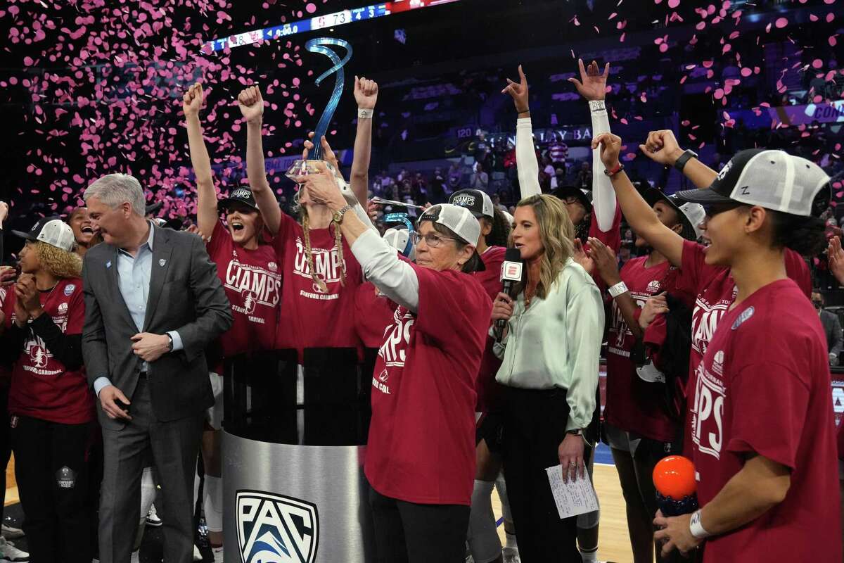 LAS VEGAS, NEVADA - MARCH 06: Stanford Cardinal head coach head coach Tara VanDerveer lifts the trophy after her team's victory against the Utah Utes in the championship game of the Pac-12 Conference women's basketball tournament at Michelob ULTRA Arena on March 06, 2022 in Las Vegas, Nevada. The Cardinal defeated the Utes 73-48. (Photo by Joe Buglewicz/Getty Images)