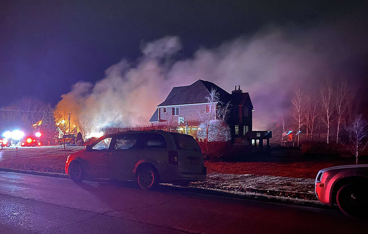 Firefighters from multiple departments battled a house fire on Outer Drive in Bad Axe on Sunday evening.