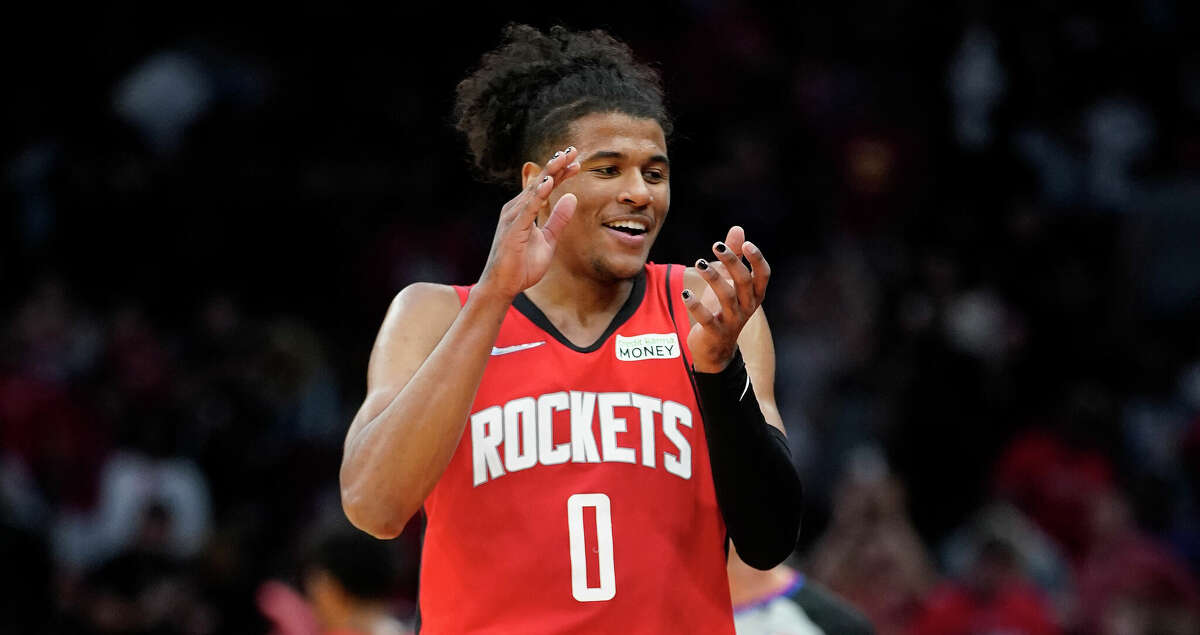 Houston Rockets guard Jalen Green (0) celebrates after the Rockets beat the Memphis Grizzlies 123-112 during an NBA basketball game at Toyota Center on Sunday, March 6, 2022 in Houston.