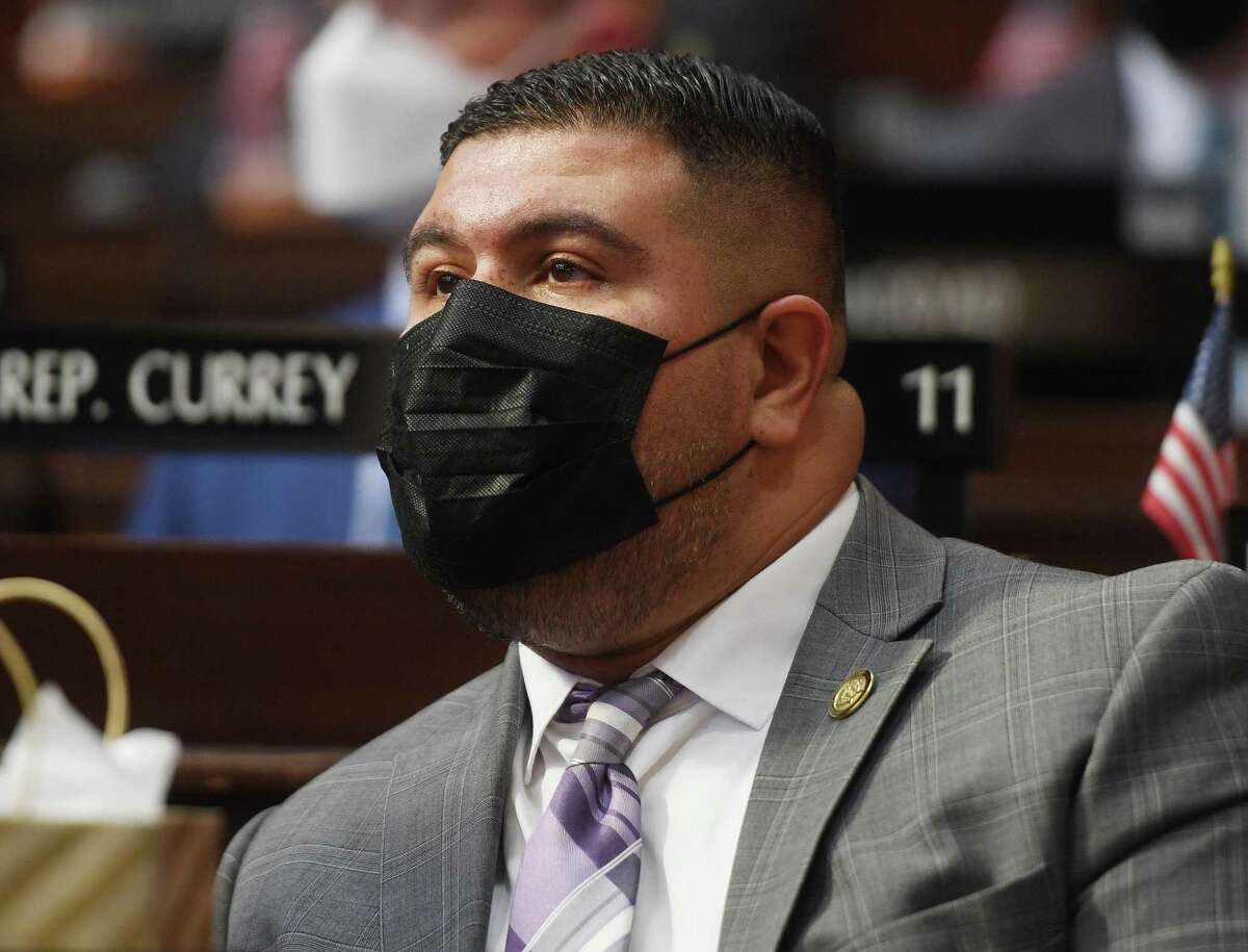Rep. Chris Rosario, D-Bridgeport, attends the opening day of the 2022 legislative session at the Capitol in Hartford, Conn. on Wednesday, February 9, 2022.