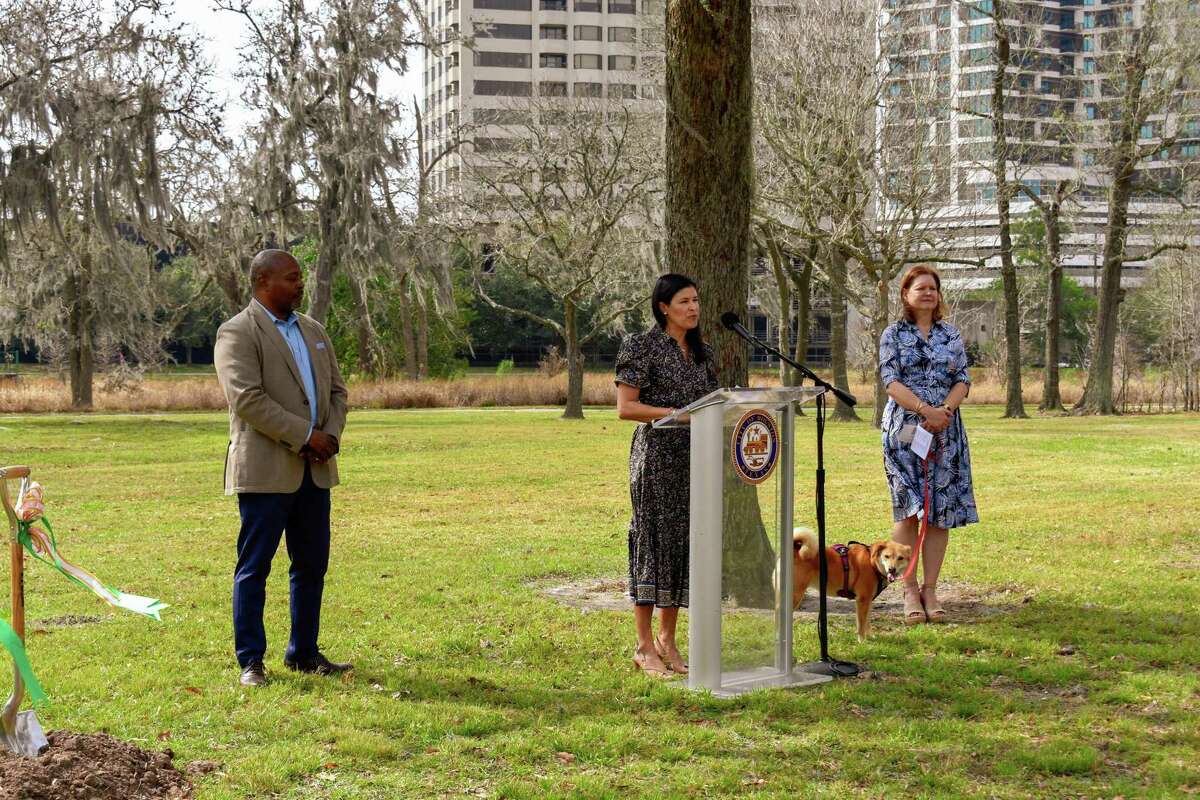 Hermann Park Conservancy board chair Kristy Bradshaw addresses the crowd at a ground breaking for a new dog park, the first step in Hermann Park's 20-year master plan.