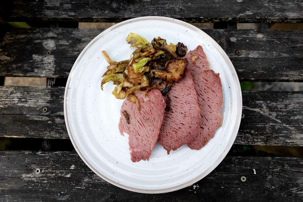Corned beef brisket cooked in a smoker had a tender texture and lighter color than the ones cooked in the oven or on a grill.