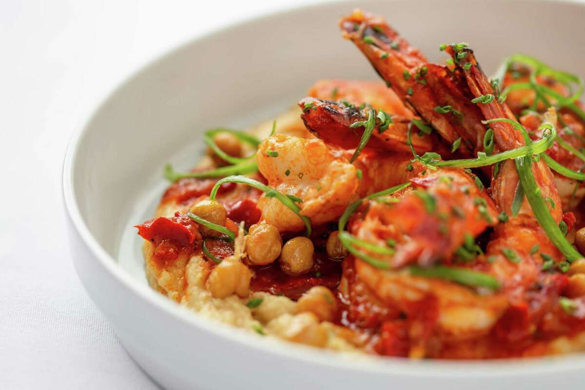 Jumbo shrimp in spicy pomodoro sauce on a chickpea puree from the original B.B. Italia Kitchen & Bar now relocating to Sugar Land Town Square.