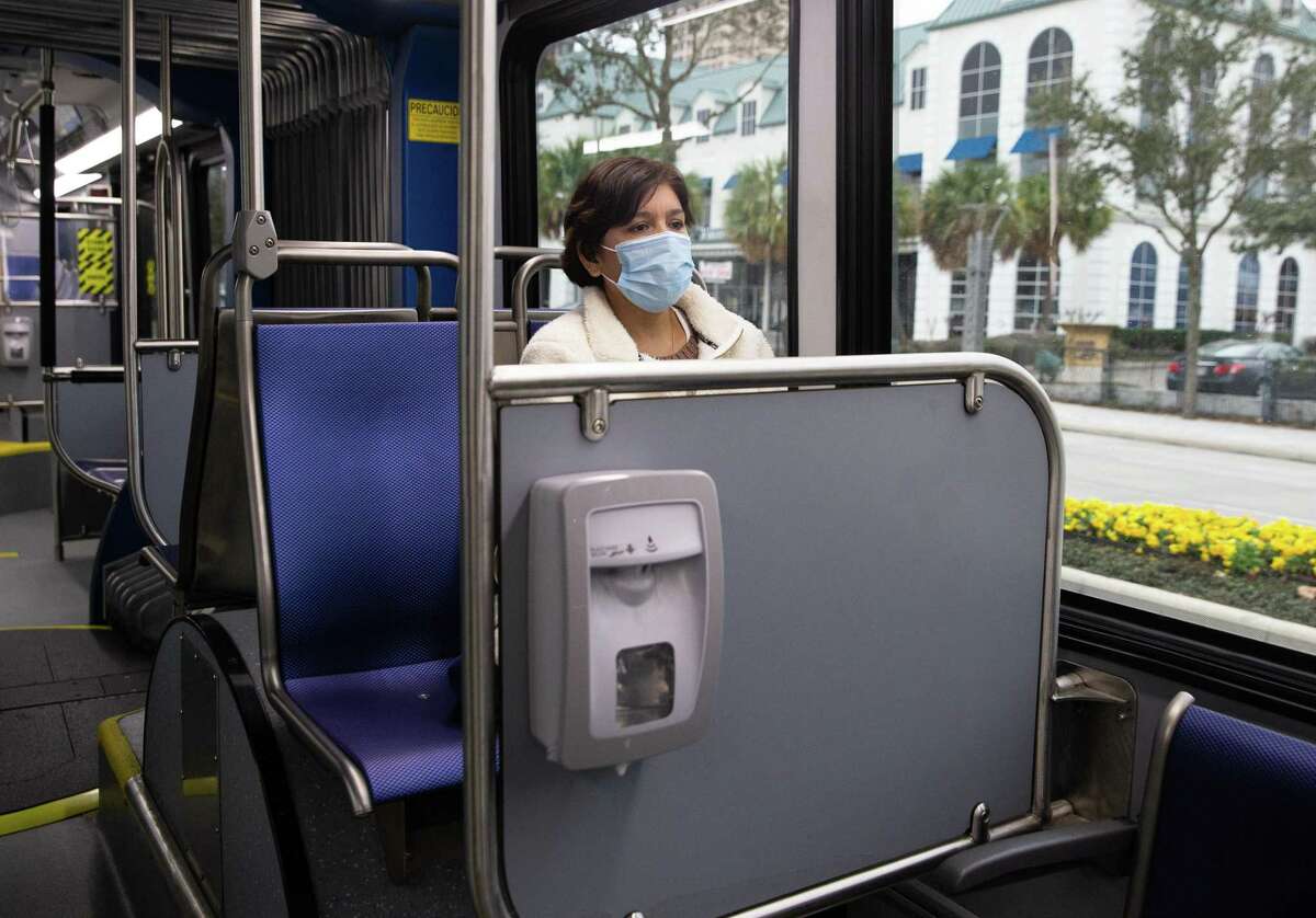 Alma Cato, of Cypress, rides on the Metropolitan Transit Authority Silver Line to head home Thursday, Feb. 24, 2022, in Houston. Cato rides a park and ride bus and Silver Line back and forth to work.