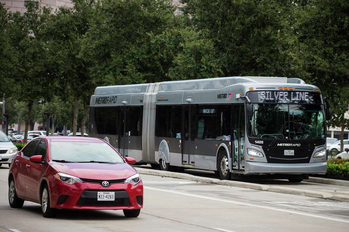 A Metro Silver Line bus rolls along Post Oak in the Galleria on Thursday, Aug. 26, 2021 in Houston.