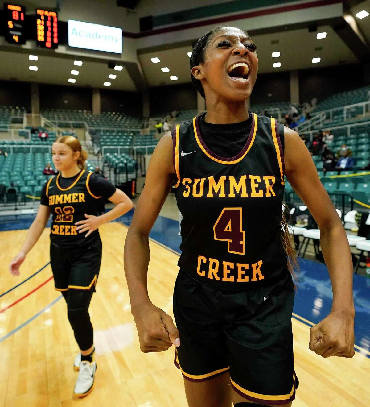 Summer Creek’s Kaitlyn Duhon (4) celebrates the team's win over Dulles in a Region III-6A semifinal high school basketball playoff game, Friday, Feb. 25, 2022, in Katy, TX.