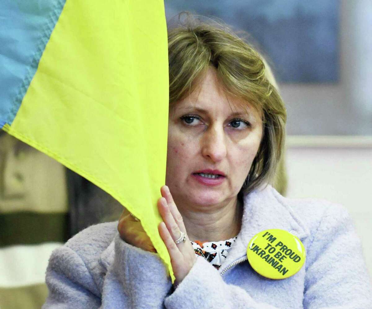 In this Hearst Connecticut Media file photo, East Haven's Natalie Chermak holds a flag during a Ukraine press conference and rally at St. Michael the Archangel Ukrainian Catholic Church in New Haven on Feb. 27.