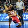 North Carolina State’s Jakob Camacho wrestles Pitt’s Gage Curry during the 125-pound semifinals at the ACC wrestling championships on Sunday, March 6, 2022 at John Paul Jones Arena on Charlottesville, Va.