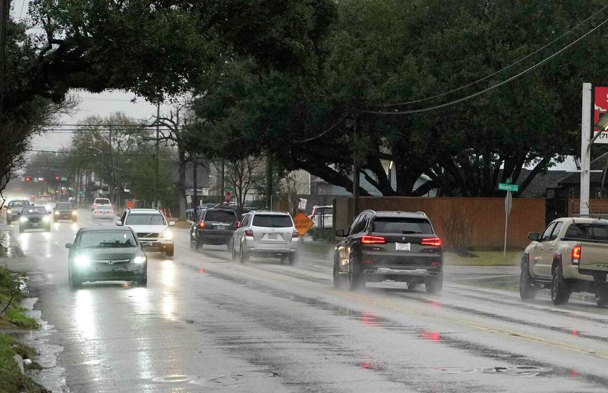 Traffic moves along 11th Street near Nicholson where the Heights Hike and Bike Trails crosses 11th Street shown Monday, Jan. 31, 2022 in Houston.