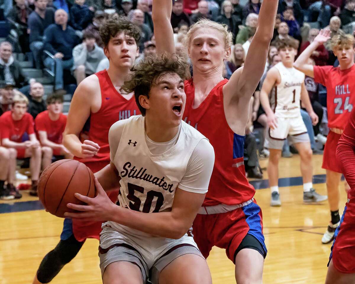 Stillwater forward Jaxon Mueller drives to the basket in a sectional game this season. Mueller is averaging 19 points and 15 rebounds per game during the postseason.