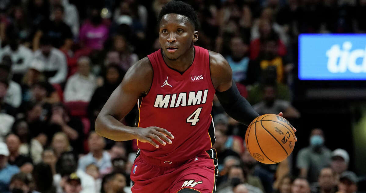Miami Heat guard Victor Oladipo (4) handles the ball during the second half of an NBA basketball game against the Houston Rockets, Monday, March 7, 2022, in Miami. (AP Photo/Marta Lavandier)