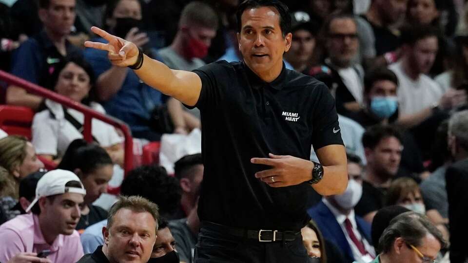 Miami Heat head coach Erik Spoelstra gestures during the second half of an NBA basketball game against the Houston Rockets, Monday, March 7, 2022, in Miami. (AP Photo/Marta Lavandier)