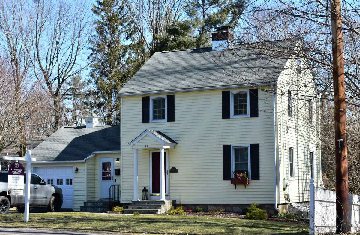 A house listed for sale by Berkshire Hathaway HomeServices New England Properties on Friday, March 4, 2022, just off Interstate 95 in Fairfield, Conn.
