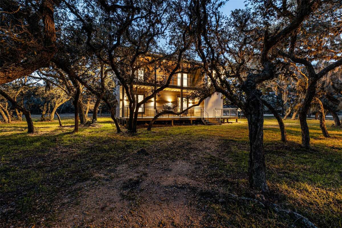 A unique 257-acre high-fenced and furnished ranch, accompanied by a five-acre clear lake recently hit the market just south of El Campo for $5.299 million.
