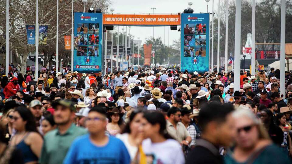 Crowds flock to the grounds of the Houston Livestock Show and Rodeo Sunday, March 6, 2022 in Houston.