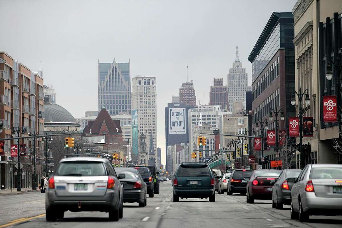 Traffic moves along a street February 24, 2013 in Detroit, Mich. (Photo by J.D. Pooley/Getty Images)