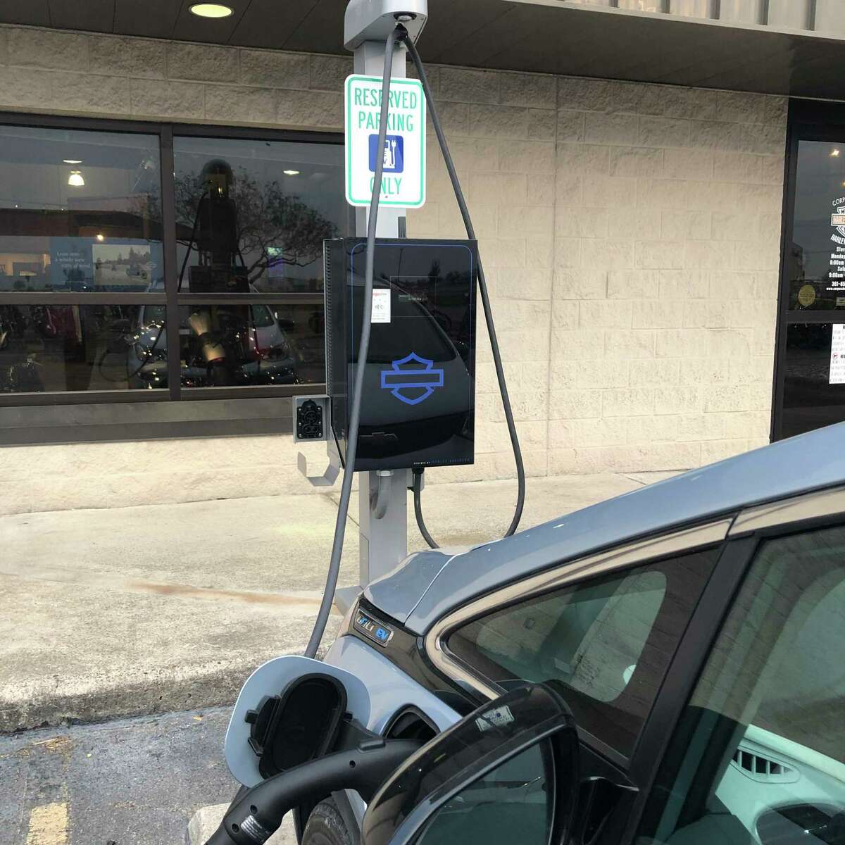 A Chevy Bolt charging at the DC Fast Charging facility at the Harley Davidson dealership in Corpus Christi, Texas.