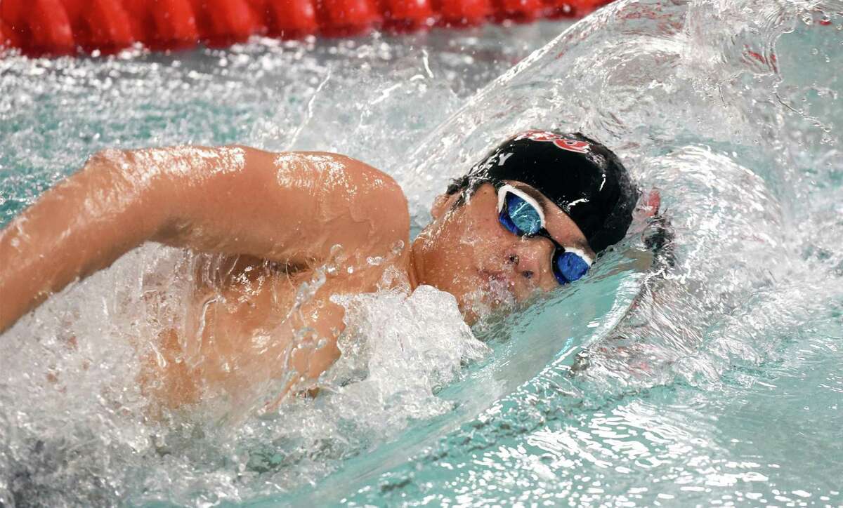 New Canaan's Jack Haley competes in the 200 freestyle during the FCIAC boys swimming finals in Greenwich on Thursday, March 3, 2022.