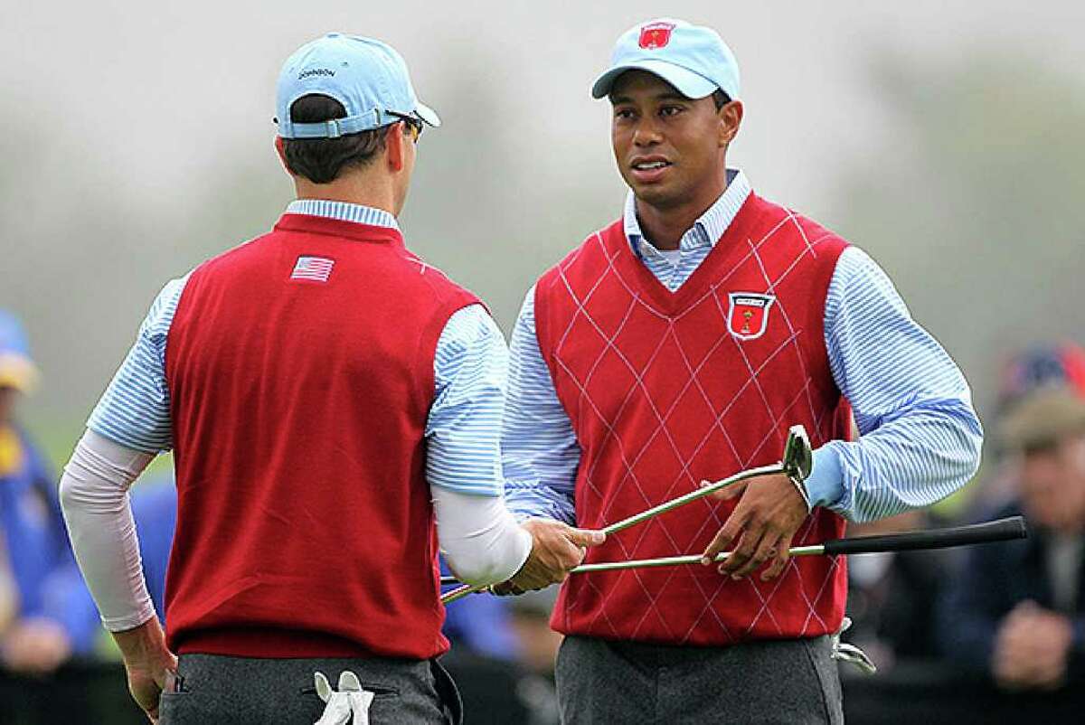 NEWPORT, WALES - SEPTEMBER 28: Tiger Woods of the USA chats with Zach Johnson (L) during a practice round prior to the 2010 Ryder Cup at the Celtic Manor Resort on September 28, 2010 in Newport, Wales. (Photo by Andy Lyons/Getty Images) *** Local Caption *** Tiger Woods;Zach Johnson