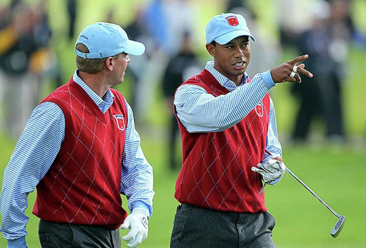NEWPORT, WALES - SEPTEMBER 28: Tiger Woods of the USA chats with Steve Stricker (L) during a practice round prior to the 2010 Ryder Cup at the Celtic Manor Resort on September 28, 2010 in Newport, Wales. (Photo by Andy Lyons/Getty Images) *** Local Caption *** Tiger Woods;Steve Stricker