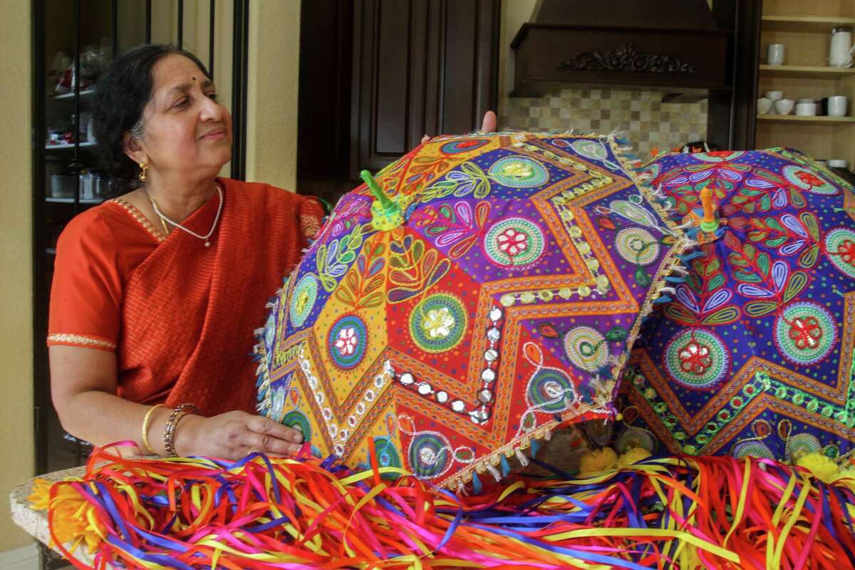 Lata Srivatsan with decorations for Holi in Sugar Land on March 5, 2022.
