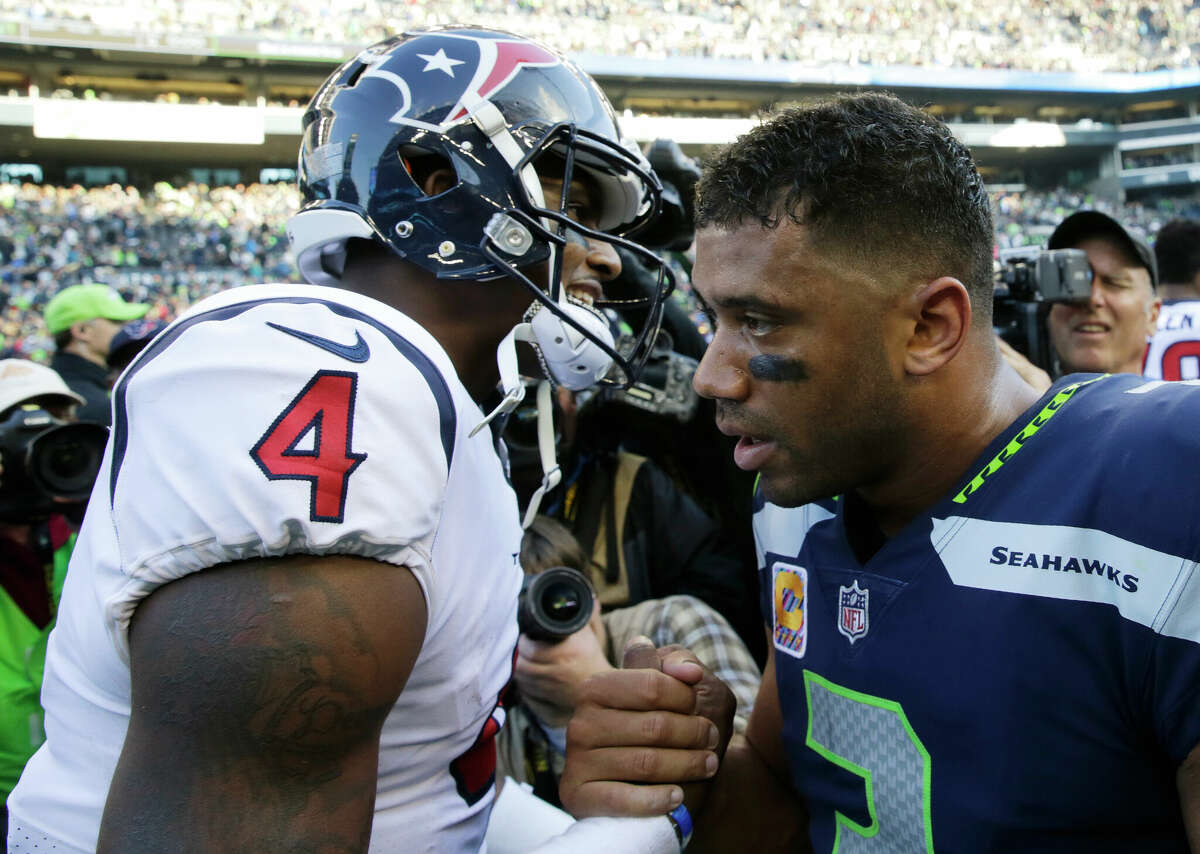 Russell Wilson (right) is headed to Denver, which had been rumored to be a destination for Deshaun Watson since he demanded a trade from the Texans.