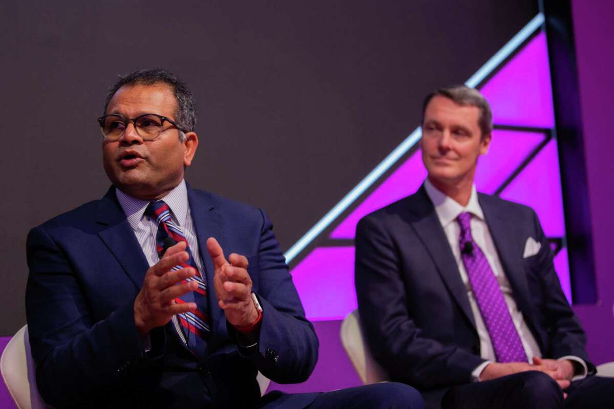 Santh Sathya CEO at LuftCar LLC and Bill Elrick, right, executive director at California Fuel Cell Partnership ( CaFCP) participate in a panel discussion about decarbonizing planes, trains, and automobiles during the CERAWeek by S&P Global, Tuesday, March 8, 2022, in Houston.