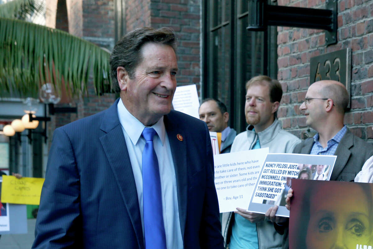 Rep. John Garamendi walks past demonstrators protesting outside of a fundraising event attended by Speaker of the House Nancy Pelosi in San Francisco, Calif. on Friday, June 28, 2019. (Crop of larger photo)