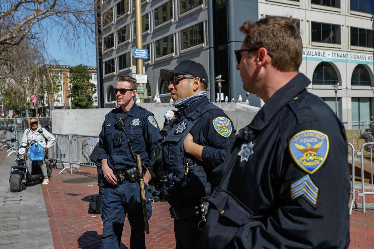 San Francisco Supervisor Gordon Mar hopes to make each of the city’s 10 police districts work with the communities they serve to develop annual plans for preventing crime. Police officers patrol Civic Center Plaza in this file photo from Feb. 25, 2022.