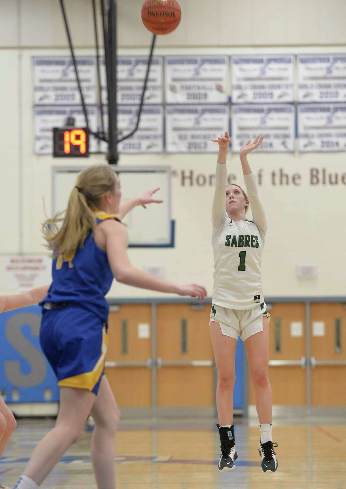 Schalmont's Siena Hallberg shoots the ball as Gouverneur's Raelin Burns looks on during their Class B state sub-regional on Tuesday, Mar. 8, 2022, in Saratoga Springs, N.Y. (Jenn March, Special to the Times Union)