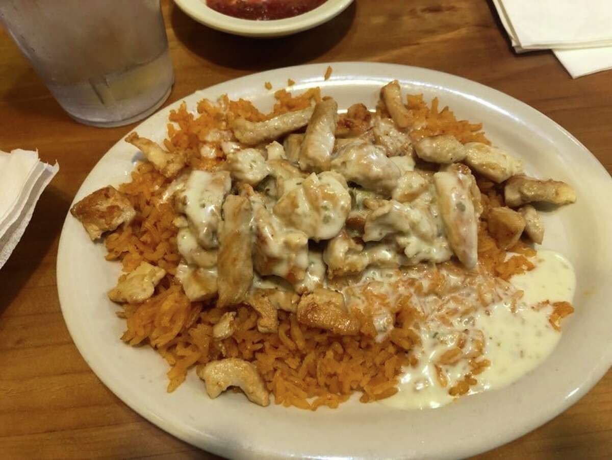 Pictured is the grilled chicken lunch at Rancheritos Mexican Grill. The dish includes Mexican rice, grilled chicken and a spicy cheese sauce.