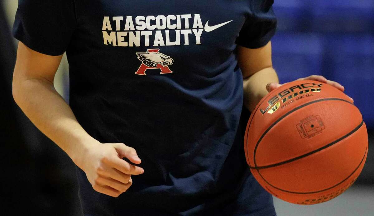 An Atascocita player warms up before the Region III-6A final high school basketball playoff game against Shadow Creek, Saturday, March 5, 2022, in Cypress, TX.