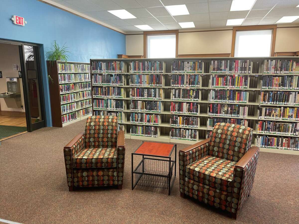 The main floor of the library branch in Manistee has been redecorated with new carpets and shelving. 