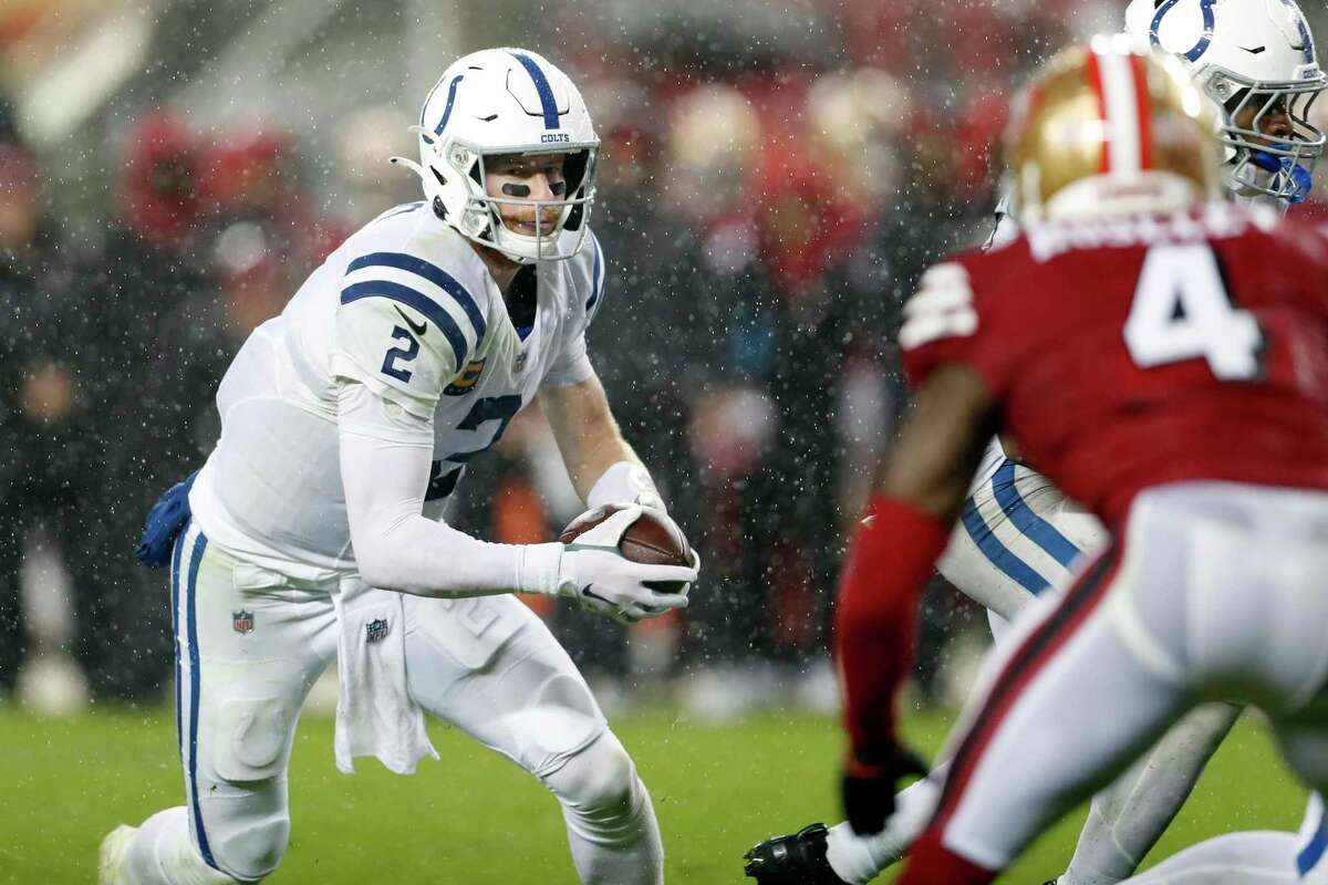 Indianapolis Colts' Carson Wentz rushes for a touchdown in 2nd quarter of 30-18 win over San Francisco 49ers during NFL game at Levi's Stadium in Santa Clara, Calif., on Sunday, October 24, 2021.