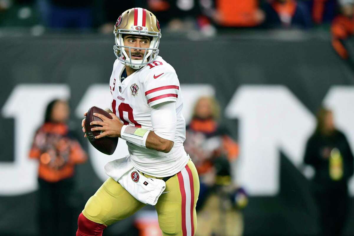 49ers quarterback Jimmy Garoppolo drops back to pass during an NFL football game against the Cincinnati Bengals, on Dec. 12, 2021, in Cincinnati.