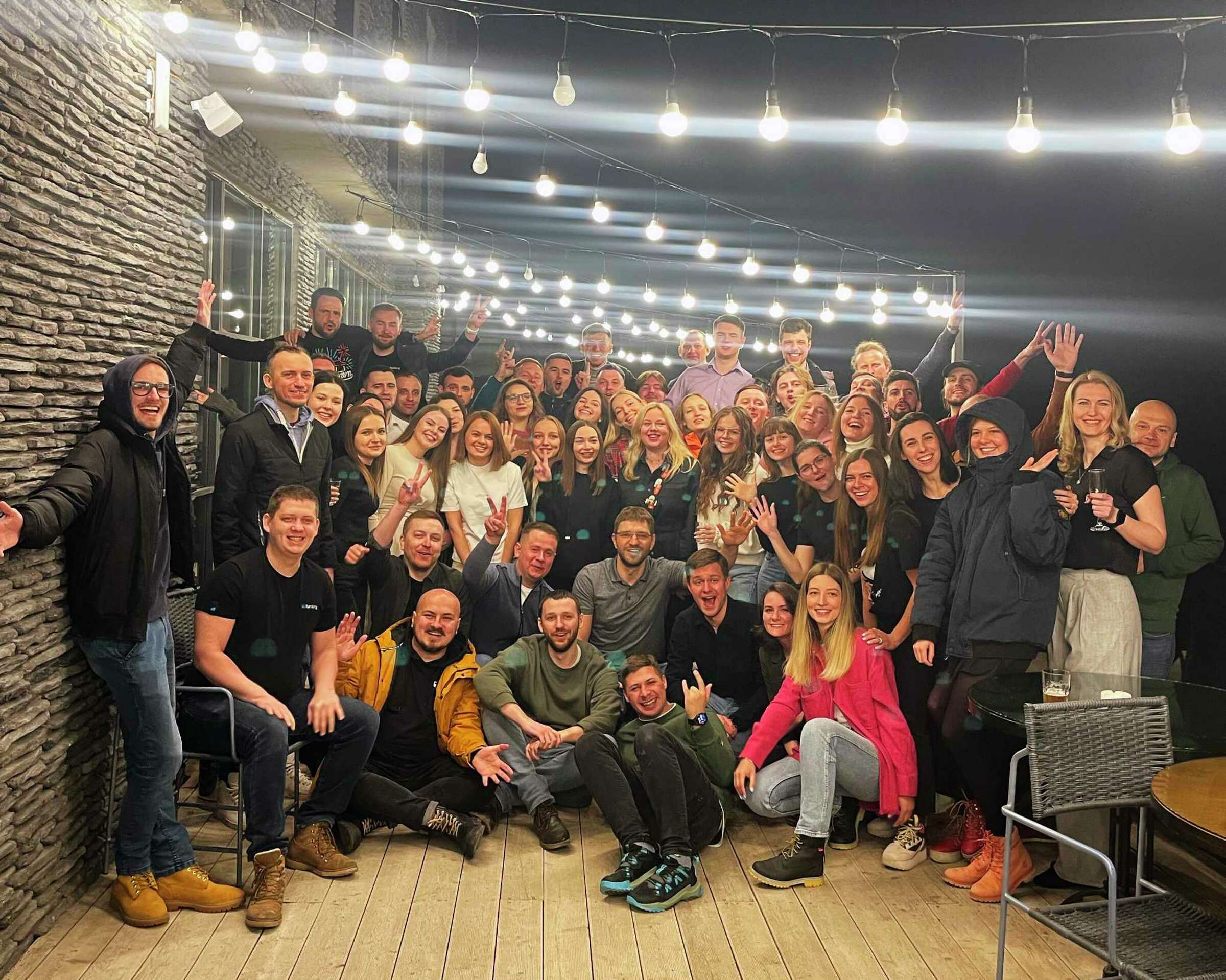  Tatiana Perebeinis, an employee of Palo Alto company SE Ranking is pictured on the right side of this group pose of company employees. Perebeinis was killed by mortar fire in Ukraine earlier this week.