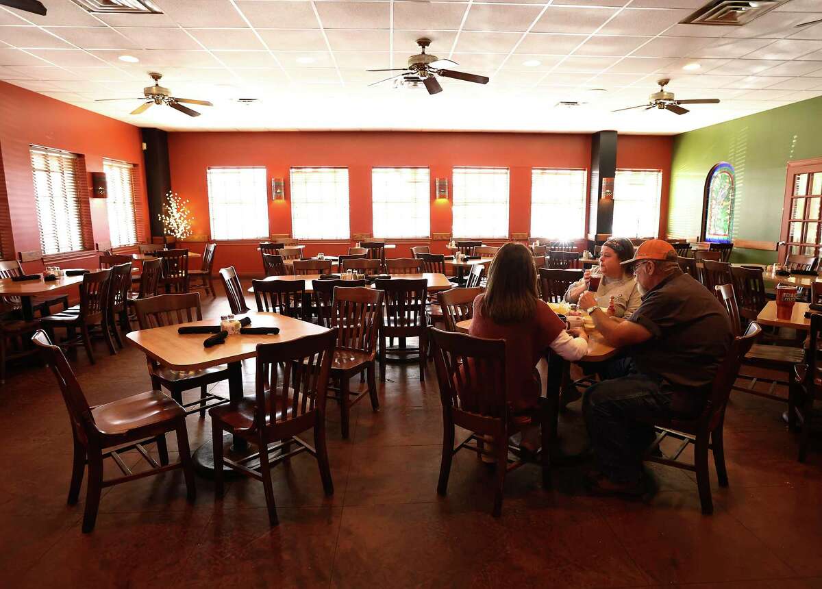 A single table of patrons is all there is at El Ranchito in Seguin on Wednesday, March 9, 2022. Normally, the business is full during lunch hour. The city of Seguin is dealing with a natural gas outage that could last for days.
