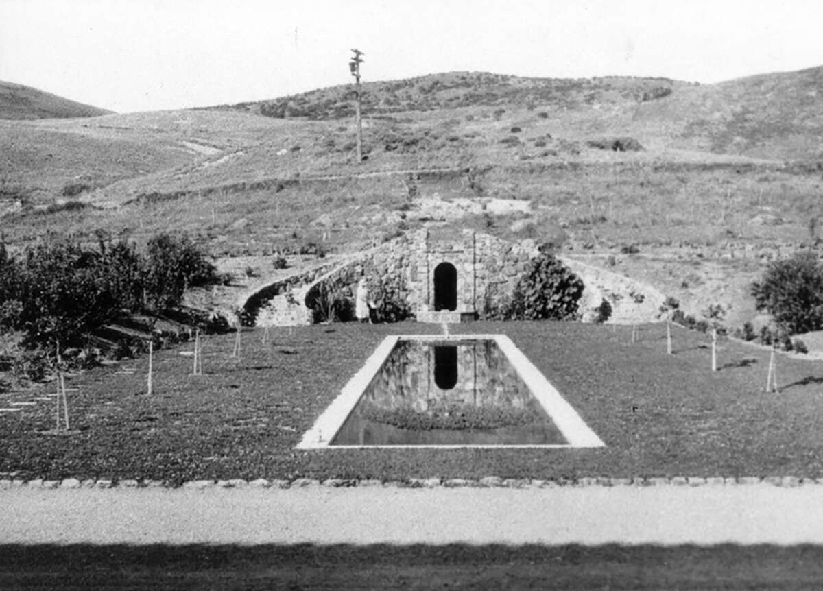 The grotto featuring the freshly planted magnolia trees, 1924.