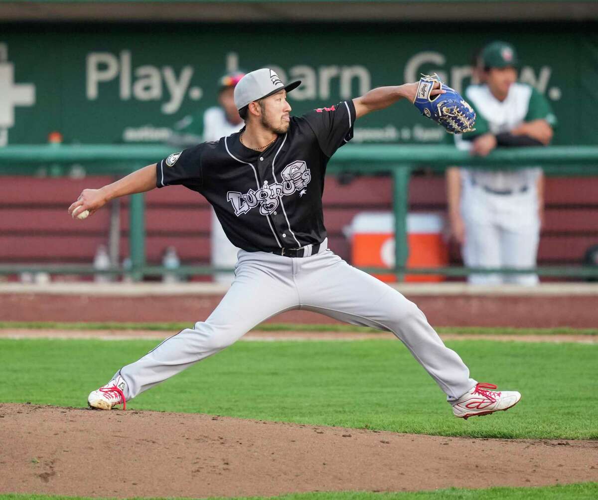 Shohei Tomioka pitches for the Lansing Lugnuts in 2021.