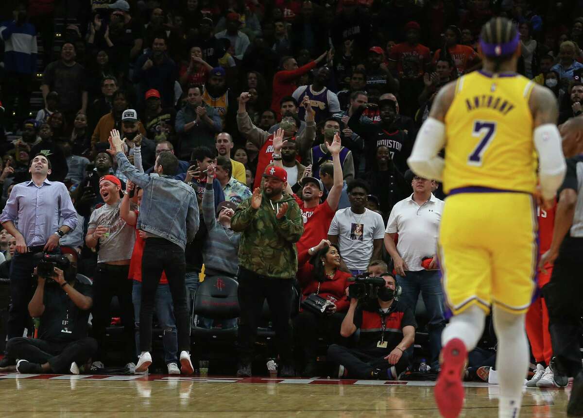 Houston Rockets fans cheer for the team leading Los Angeles Lakers during the overtime of the NBA game Wednesday, March 9, 2022, at Toyota Center in Houston. Houston Rockets defeated Los Angeles Lakers 139-130.