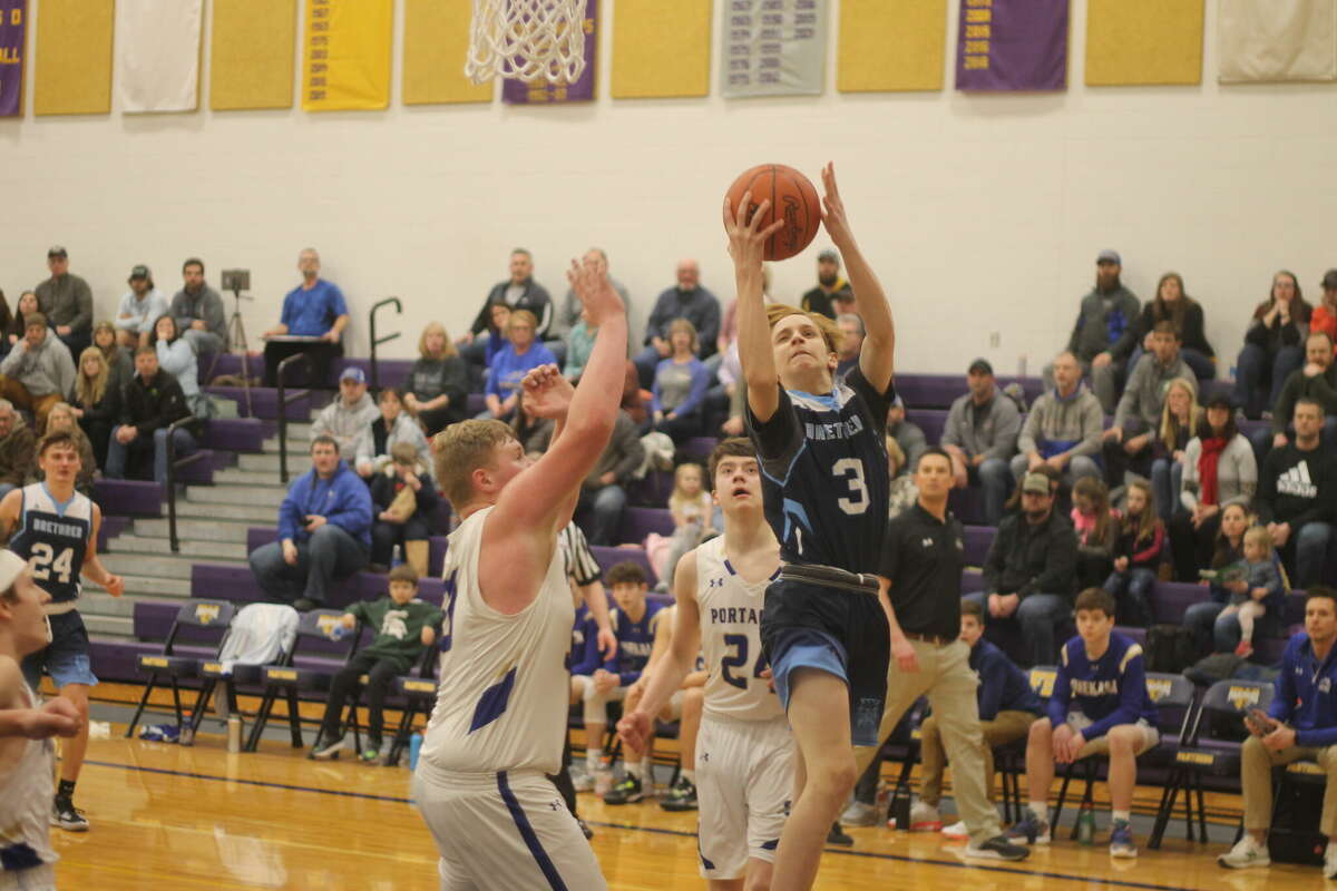 Brethren's Kaylon Tighe goes up for a layup during the Bobcats' 51-48 win over Onekama in a Divison 4 district semifinal in Frankfort on Wednesday.