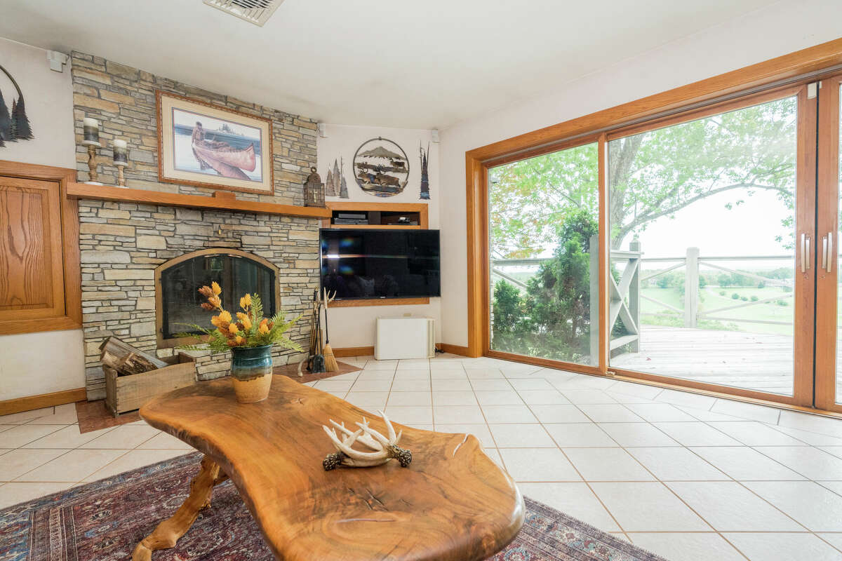 This week’s house was built into a hillside along 1139 Middleline Road in Milton, which created a beautiful view from the deck and single-story living at the same time. Some of the 1990s interiors may need a makeover, but the natural elements used in the design are timeless. Exterior interest includes a bridge over a water feature at the front door. The house has four bedrooms and four bathrooms — one bedroom and bathroom are part of an in-law suite. The house has an open layout, a heated, three-car garage, two fireplaces and sits on a 14-acre-lot. Built in 1991, the house has 4,239 square feet of living space. Ballston Spa schools. Taxes: Approximately $8,000. List price: $975,000. Contact listing agent Karan Murray with Roohan Realty at 518-312-0723.