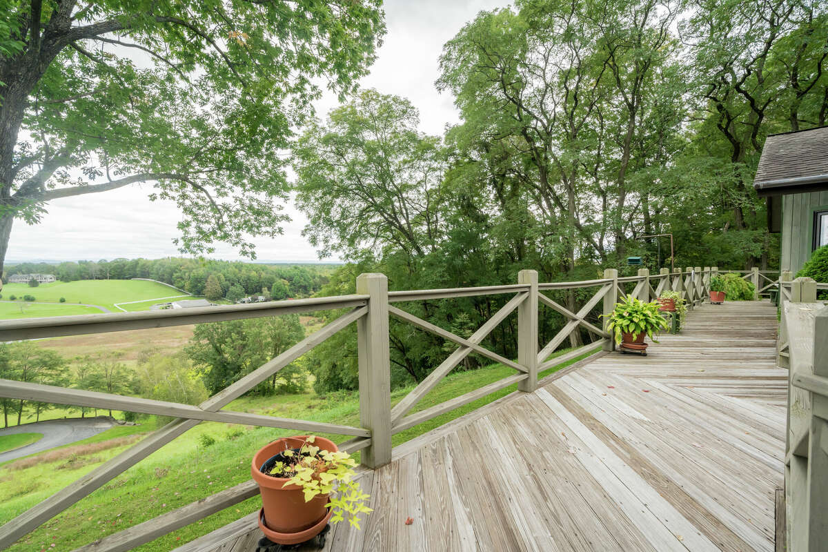 This week’s house was built into a hillside along 1139 Middleline Road in Milton, which created a beautiful view from the deck and single-story living at the same time. Some of the 1990s interiors may need a makeover, but the natural elements used in the design are timeless. Exterior interest includes a bridge over a water feature at the front door. The house has four bedrooms and four bathrooms — one bedroom and bathroom are part of an in-law suite. The house has an open layout, a heated, three-car garage, two fireplaces and sits on a 14-acre-lot. Built in 1991, the house has 4,239 square feet of living space. Ballston Spa schools. Taxes: Approximately $8,000. List price: $975,000. Contact listing agent Karan Murray with Roohan Realty at 518-312-0723.