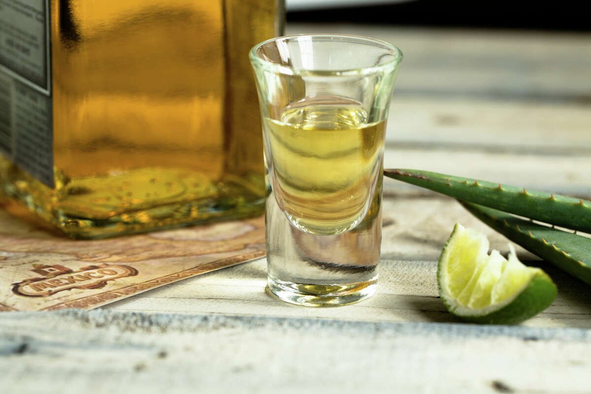 A close-up of a tequila shot.