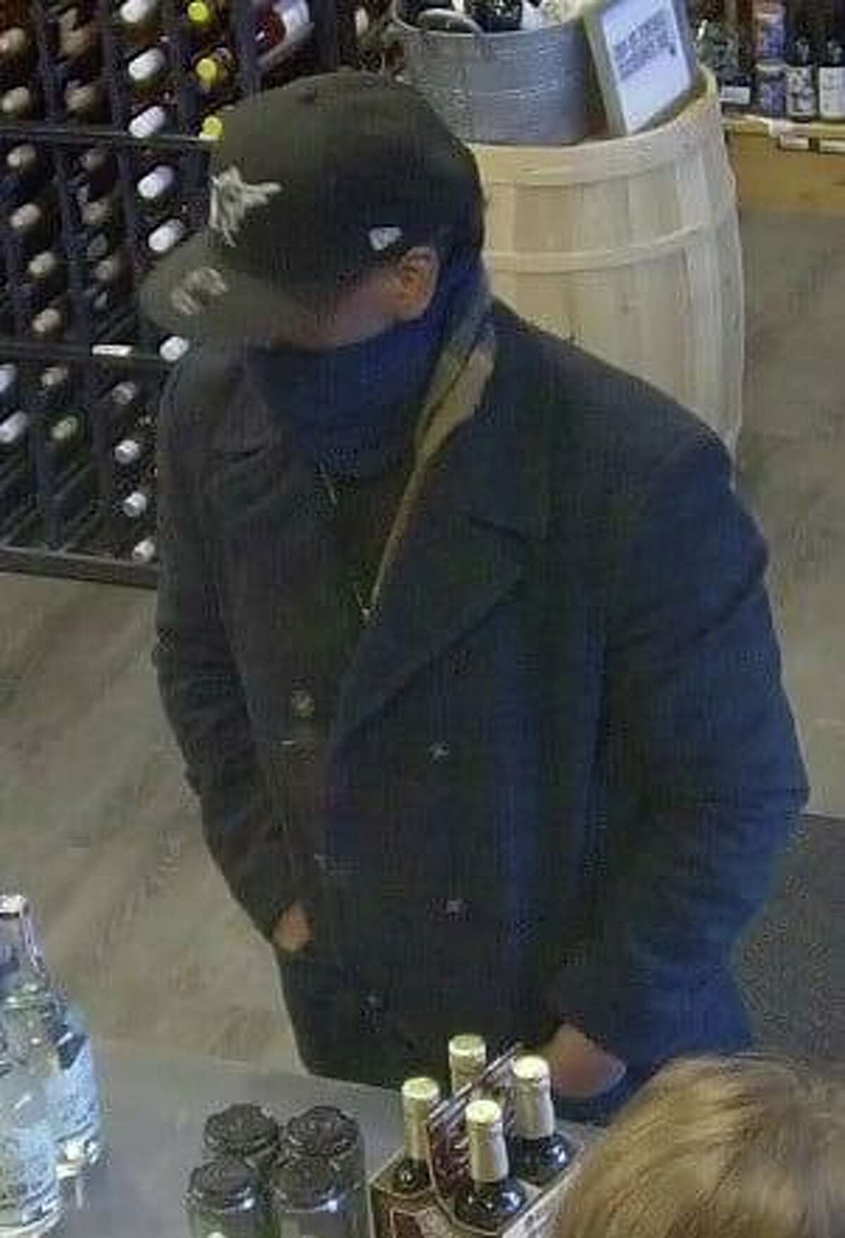Police are seeking the public’s help in identifying this man, who is wanted in connection with a recent liquor store larceny in Roxbury, Conn.